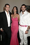 Eric Richman, Amanda Richman, and guest at the Parrish Art Museum's Midsummer   Gala in Southampton, N.Y. on July 17, 2004. photo by Rob Rich copyright 2004 516-676-3939 robwayne1@aol.com 112 12th. Ave, Sea Cliff, N.Y. 11579 USA