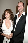 Lorraine Bracco and Jason Cippola at the Parrish Art Museum's Midsummer   Gala in Southampton, N.Y. on July 17, 2004. photo by Rob Rich copyright 2004 516-676-3939 robwayne1@aol.com 112 12th. Ave, Sea Cliff, N.Y. 11579 USA