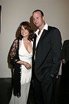 Lorraine Bracco and Jason Cippola at the Parrish Art Museum's Midsummer   Gala in Southampton, N.Y. on July 17, 2004. photo by Rob Rich copyright 2004 516-676-3939 robwayne1@aol.com 112 12th. Ave, Sea Cliff, N.Y. 11579 USA
