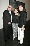 Cenk Cokuslu, Harriet Weintraub, and Paul Lerner  at the Parrish Art Museum's Midsummer   Gala in Southampton, N.Y. on July 17, 2004. photo by Rob Rich copyright 2004 516-676-3939 robwayne1@aol.com 112 12th. Ave, Sea Cliff, N.Y. 11579 USA