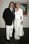 Larry and Michelle Herbert  at the Parrish Art Museum's Midsummer   Gala in Southampton, N.Y. on July 17, 2004. photo by Rob Rich copyright 2004 516-676-3939 robwayne1@aol.com 112 12th. Ave, Sea Cliff, N.Y. 11579 USA