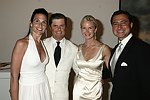 Whitney and James Fairchild, Mary Katherine Norman and Alex  at the Parrish Art Museum's Midsummer   Gala in Southampton, N.Y. on July 17, 2004. photo by Rob Rich copyright 2004 516-676-3939 robwayne1@aol.com 112 12th. Ave, Sea Cliff, N.Y. 11579 USA
