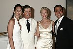 Whitney and James Fairchild, Mary Katherine Norman and Alex  at the Parrish Art Museum's Midsummer   Gala in Southampton, N.Y. on July 17, 2004. photo by Rob Rich copyright 2004 516-676-3939 robwayne1@aol.com 112 12th. Ave, Sea Cliff, N.Y. 11579 USA