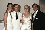 Whitney and James Fairchild, Mary Katherine Norman and Alex  at the Parrish Art Museum's Midsummer   Gala in Southampton, N.Y. on July 17, 2004. photo by Rob Rich copyright 2004 516-676-3939 robwayne1@aol.com 112 12th. Ave, Sea Cliff, N.Y. 11579 USA