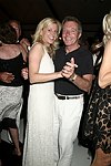 Cynthia and Dan Lufkin  at the Parrish Art Museum's Midsummer   Gala in Southampton, N.Y. on July 17, 2004. photo by Rob Rich copyright 2004 516-676-3939 robwayne1@aol.com 112 12th. Ave, Sea Cliff, N.Y. 11579 USA