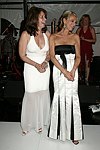 Lorraine Bracco and Debbie Bancroft  at the Parrish Art Museum's Midsummer   Gala in Southampton, N.Y. on July 17, 2004. photo by Rob Rich copyright 2004 516-676-3939 robwayne1@aol.com 112 12th. Ave, Sea Cliff, N.Y. 11579 USA