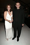 Lorraine Bracco and Ferhan Geylan at the Parrish Art Museum's Midsummer   Gala in Southampton, N.Y. on July 17, 2004. photo by Rob Rich copyright 2004 516-676-3939 robwayne1@aol.com 112 12th. Ave, Sea Cliff, N.Y. 11579 USA