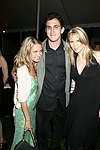 Amanda Hearst, Nick Raynes, and Marissa Bregman at the Parrish Art Museum's Midsummer   Gala in Southampton, N.Y. on July 17, 2004. photo by Rob Rich copyright 2004 516-676-3939 robwayne1@aol.com 112 12th. Ave, Sea Cliff, N.Y. 11579 USA