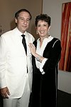 Howard Blum and Beth Rudin DeWoody at the Parrish Art Museum's Midsummer   Gala in Southampton, N.Y. on July 17, 2004. photo by Rob Rich copyright 2004 516-676-3939 robwayne1@aol.com 112 12th. Ave, Sea Cliff, N.Y. 11579 USA