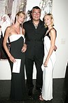 Levent Piskiner with Gilan jewelry models at the Parrish Art Museum's Midsummer   Gala in Southampton, N.Y. on July 17, 2004. photo by Rob Rich copyright 2004 516-676-3939 robwayne1@aol.com 112 12th. Ave, Sea Cliff, N.Y. 11579 USA