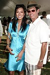 Kelly Chow and Mark Seidenfeld at the Mercedes Benz Polo Challenge on July 17, 2004 in Bridgehampton, N.Y.  photo by Rob Rich copyright 2004<br>516-676-3939 robwayne1@aol.com