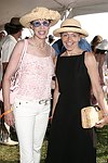 Sale Johnson and Karen Schecter  at the Mercedes Benz Polo Challenge on July 17, 2004 in Bridgehampton, N.Y.  photo by Rob Rich copyright 2004<br>516-676-3939 robwayne1@aol.com