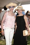 Sale Johnson and Karen Schecter  at the Mercedes Benz Polo Challenge on July 17, 2004 in Bridgehampton, N.Y.  photo by Rob Rich copyright 2004<br>516-676-3939 robwayne1@aol.com