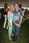 Michelle and Steve Boxer  at the Mercedes Benz Polo Challenge on July 17, 2004 in Bridgehampton, N.Y.  photo by Rob Rich copyright 2004<br>516-676-3939 robwayne1@aol.com