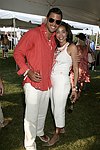 Al Reynolds and Jaci Reed at the Mercedes Benz Polo Challenge on July 17, 2004 in Bridgehampton, N.Y.  photo by Rob Rich copyright 2004<br>516-676-3939 robwayne1@aol.com