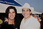 Nacho Figueras and R. Couri Hay  at the Mercedes Benz Polo Challenge on July 17, 2004 in Bridgehampton, N.Y.  photo by Rob Rich copyright 2004<br>516-676-3939 robwayne1@aol.com