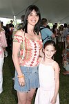 Elyse and Nicole Slaine at the Mercedes Benz Polo Challenge on July 17, 2004 in Bridgehampton, N.Y.  photo by Rob Rich copyright 2004<br>516-676-3939 robwayne1@aol.com