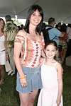 Elyse and Nicole Slaine at the Mercedes Benz Polo Challenge on July 17, 2004 in Bridgehampton, N.Y.  photo by Rob Rich copyright 2004<br>516-676-3939 robwayne1@aol.com