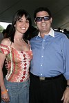 Elyse Slaine and Robert Siebel at the Mercedes Benz Polo Challenge on July 17, 2004 in Bridgehampton, N.Y.  photo by Rob Rich copyright 2004<br>516-676-3939 robwayne1@aol.com