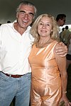 Gregg Papadopoulos and Nina Kaminska  at the Mercedes Benz Polo Challenge on July 17, 2004 in Bridgehampton, N.Y.  photo by Rob Rich copyright 2004<br>516-676-3939 robwayne1@aol.com