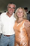 Gregg Papadopoulos and Nina Kaminska  at the Mercedes Benz Polo Challenge on July 17, 2004 in Bridgehampton, N.Y.  photo by Rob Rich copyright 2004<br>516-676-3939 robwayne1@aol.com