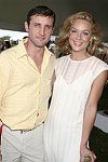 Dan Abrams and Elisabeth Rohm  at the Mercedes Benz Polo Challenge on July 17, 2004 in Bridgehampton, N.Y.  photo by Rob Rich copyright 2004<br>516-676-3939 robwayne1@aol.com