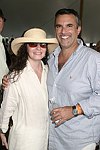  Trish Bennett and George Hirsch  at the Mercedes Benz Polo Challenge on July 17, 2004 in Bridgehampton, N.Y.  photo by Rob Rich copyright 2004<br>516-676-3939 robwayne1@aol.com
