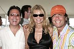 Dr.Howard Sobel, Jennifer and Todd Klein at the Mercedes Benz Polo Challenge on July 17, 2004 in Bridgehampton, N.Y.  photo by Rob Rich copyright 2004<br>516-676-3939 robwayne1@aol.com