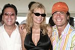 Dr.Howard Sobel, Jennifer and Todd Klein at the Mercedes Benz Polo Challenge on July 17, 2004 in Bridgehampton, N.Y.  photo by Rob Rich copyright 2004<br>516-676-3939 robwayne1@aol.com