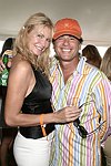 Jennifer and Todd Klein  at the Mercedes Benz Polo Challenge on July 17, 2004 in Bridgehampton, N.Y.  photo by Rob Rich copyright 2004<br>516-676-3939 robwayne1@aol.com