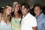 Irene Annisimova, Anna Annisimova, Mike Heller, and Mark Heller at the Mercedes Benz Polo Challenge on July 17, 2004 in Bridgehampton, N.Y.  photo by Rob Rich copyright 2004<br>516-676-3939 robwayne1@aol.com