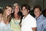 Irene Annisimova, Anna Annisimova, Mike Heller, and Mark Heller at the Mercedes Benz Polo Challenge on July 17, 2004 in Bridgehampton, N.Y.  photo by Rob Rich copyright 2004<br>516-676-3939 robwayne1@aol.com