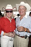 Erin O'brien and Herb Roberts at the Mercedes Benz Polo Challenge on July 17, 2004 in Bridgehampton, N.Y.  photo by Rob Rich copyright 2004<br>516-676-3939 robwayne1@aol.com