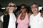Jane Schindler, L.Marilyn Crawford, Paul Schindler  at the Mercedes Benz Polo Challenge on 7-24-04 in Bridgehamton, N.Y.  photo by Rob Rich copyright 2004<br>516-676-3939  robwayne1@aol.com