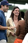 Gregg Bello and Jemilah Afshar   at the Mercedes Benz Polo Challenge on 7-24-04 in Bridgehamton, N.Y.  photo by Rob Rich copyright 2004<br>516-676-3939  robwayne1@aol.com