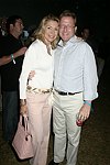 Jacqueline and Fred Stahl at the Mercedes Benz Polo Challenge on 8-21-04.  <br>photo by Rob Rich copyright 2004 516-676-3939  robwayne1@aol.com