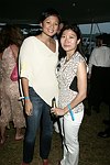 Criselda Tenazas and Elizabeth Lee at the Mercedes Benz Polo Challenge on 8-21-04.  <br>photo by Rob Rich copyright 2004 516-676-3939  robwayne1@aol.com