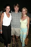 Patti Sharkey, Steve Landa, and Caroline Tyree at the Mercedes Benz Polo Challenge on 8-21-04.  <br>photo by Rob Rich copyright 2004 516-676-3939  robwayne1@aol.com