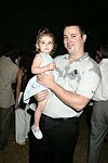 Makenna and Charlie Savnik at the Mercedes Benz Polo Challenge on 8-21-04.  <br>photo by Rob Rich copyright 2004 516-676-3939  robwayne1@aol.com