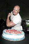 Celebrating his birthday  at the Mercedes Benz Polo Challenge on 8-21-04.  <br>photo by Rob Rich copyright 2004 516-676-3939  robwayne1@aol.com