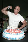 Celebrating his birthday  at the Mercedes Benz Polo Challenge on 8-21-04.  <br>photo by Rob Rich copyright 2004 516-676-3939  robwayne1@aol.com
