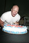 Celebrating his birthday  at the Mercedes Benz Polo Challenge on 8-21-04.  <br>photo by Rob Rich copyright 2004 516-676-3939  robwayne1@aol.com