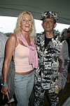 Edie Kirk and  Shail Upadhya at the Mercedes Benz Polo Challenge on 8-21-04.  <br>photo by Rob Rich copyright 2004 516-676-3939  robwayne1@aol.com
