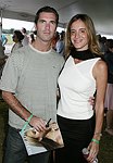 Justin Mitchell and Elizabeth  at the Mercedes Benz Polo Challenge on Bridgehamtpon, N.Y. on 8-7-04.<br>photo by Rob Rich copyright 2004<br>516-676-3939<br>robwayne1@aol.com