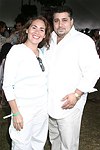 Maria Ayala Rich and James Fauci  at the Mercedes Benz Polo Challenge on Bridgehamtpon, N.Y. on 8-7-04.<br>photo by Rob Rich copyright 2004<br>516-676-3939<br>robwayne1@aol.com