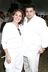 Maria Ayala Rich and James Fauci  at the Mercedes Benz Polo Challenge on Bridgehamtpon, N.Y. on 8-7-04.<br>photo by Rob Rich copyright 2004<br>516-676-3939<br>robwayne1@aol.com
