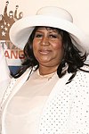 Aretha Franklin at the Sean P. Diddy Coombs  annual White Party on July 4, 2004at the Sony Playstation 2 Estate in Bridgehampton, N.Y.  (Photo by Rob Rich/Everett Collection)