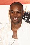 Tyson Beckford at the Sean P. Diddy Coombs  annual White Party on July 4, 2004at the Sony Playstation 2 Estate in Bridgehampton, N.Y.  (Photo by Rob Rich/Everett Collection)