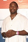 Lennox Lewis at the Sean P. Diddy Coombs  annual White Party on July 4, 2004at the Sony Playstation 2 Estate in Bridgehampton, N.Y.  (Photo by Rob Rich/Everett Collection)