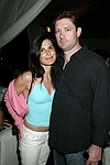  Jennifer Martin and Steve Pinkos at the after party for the movie premiere of 'RIDING GIANTS' at the Southampton home of Andrew Rosen on 7-2-04<br>photo by Rob Rich copyright 2004  516-676-3939